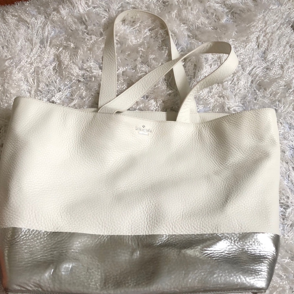 Large Kate Spade leather tote with silver accents